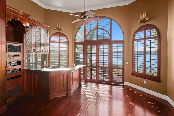 a kitchen with stainless steel appliances granite countertop a sink a stove and dishwasher