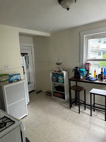 a room with furniture and window