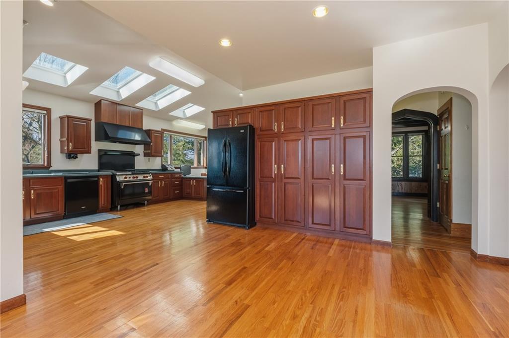 739 Butler Road Kittanning, PA 16201 - Photo 13 of 50 a view of a livingroom with kitchen and furniture