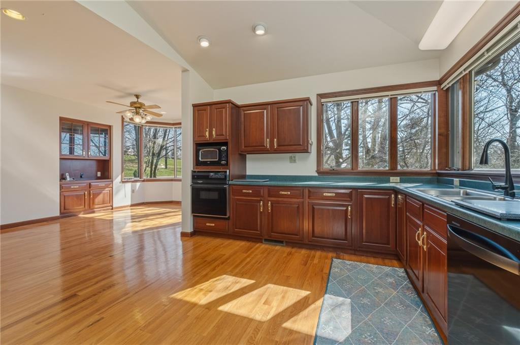 739 Butler Road Kittanning, PA 16201 - Photo 18 of 50 a large kitchen with stainless steel appliances granite countertop a large window and a counter space