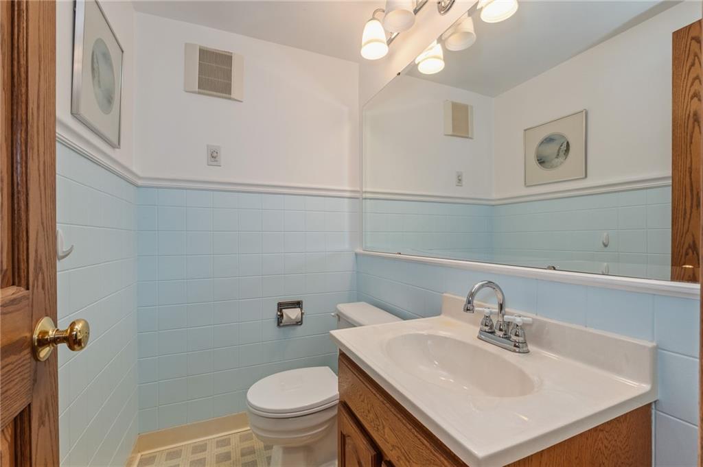 739 Butler Road Kittanning, PA 16201 - Photo 22 of 50 a bathroom with a sink vanity mirror and toilet