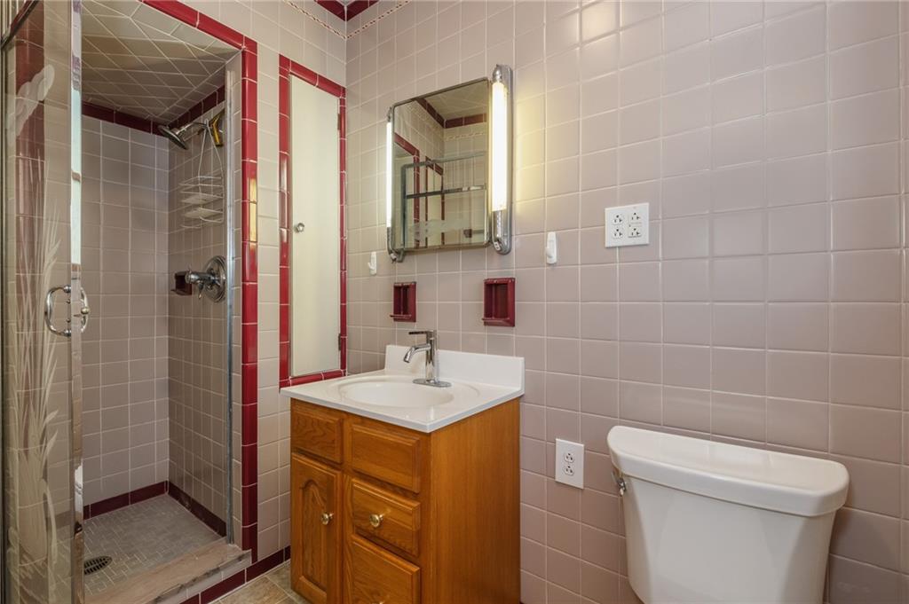 739 Butler Road Kittanning, PA 16201 - Photo 28 of 50 a bathroom with a sink toilet and shower
