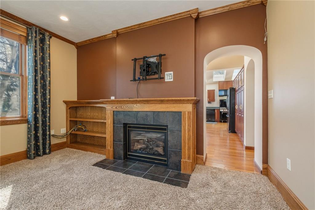 739 Butler Road Kittanning, PA 16201 - Photo 10 of 50 a living room with furniture and a fireplace