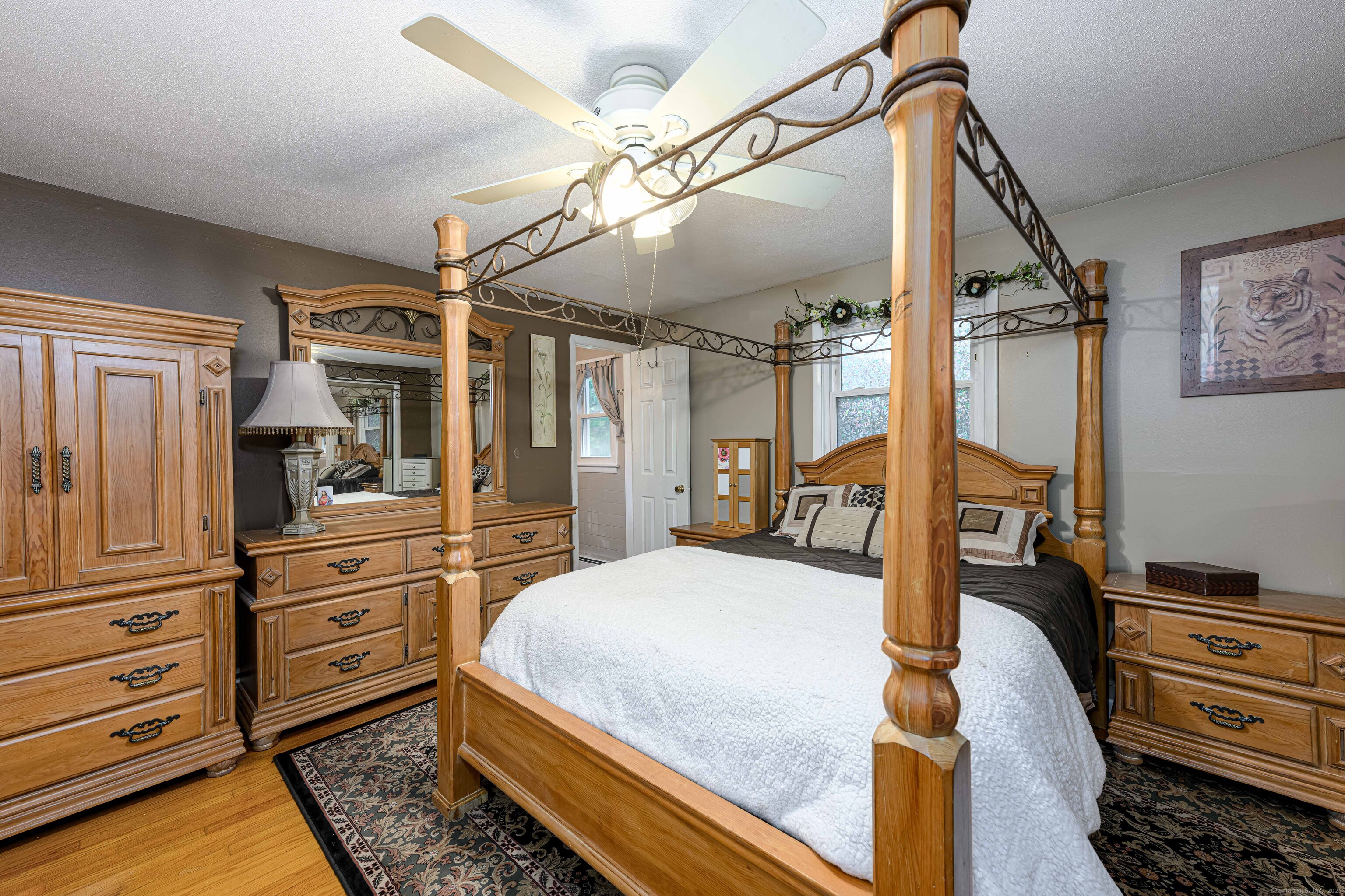 201 Rimmon Road North Haven, CT 06473 - Photo 13 of 40 a bedroom with a bed and a dresser