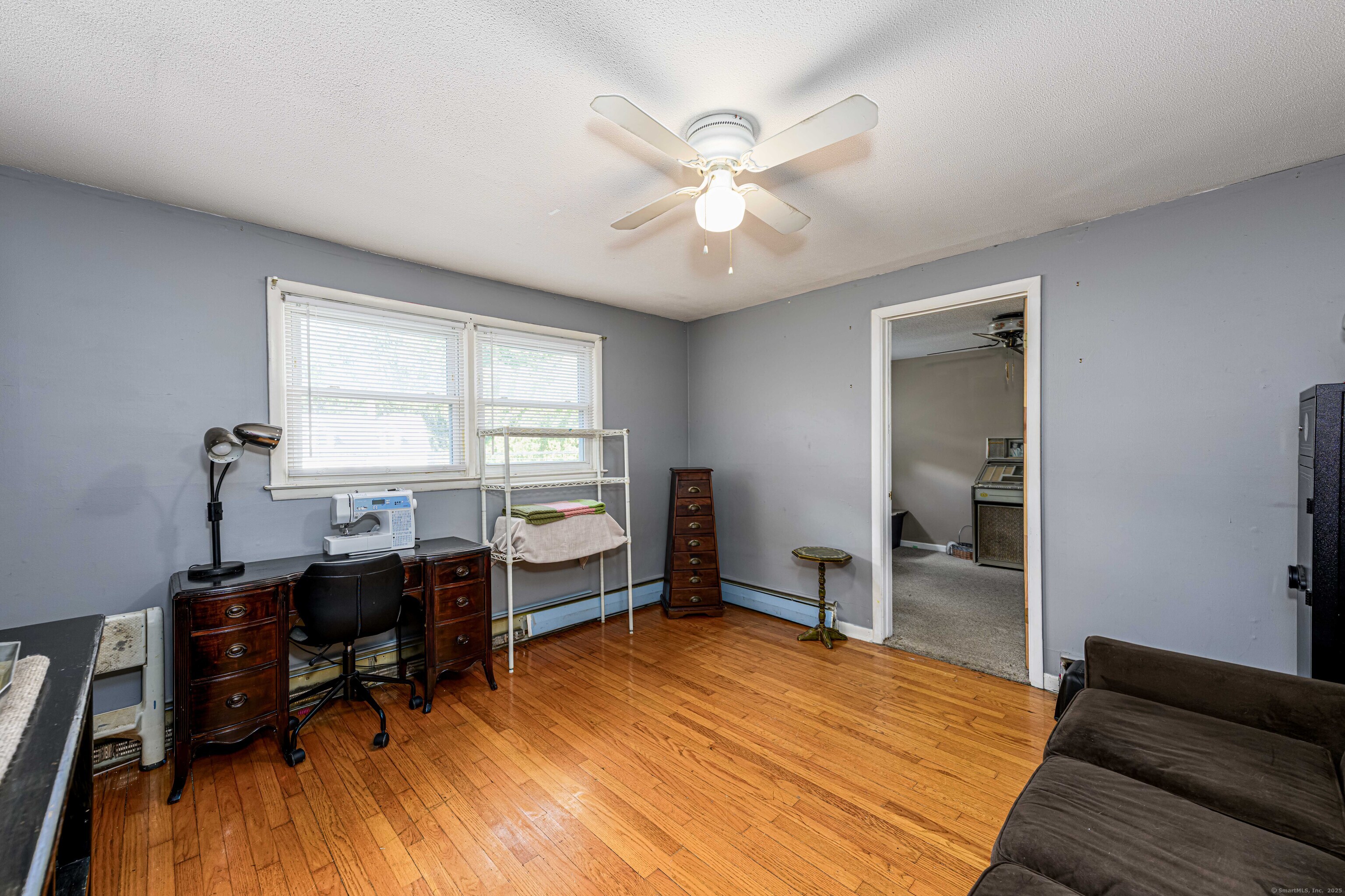 201 Rimmon Road North Haven, CT 06473 - Photo 20 of 40 a view of a workspace with furniture and a window