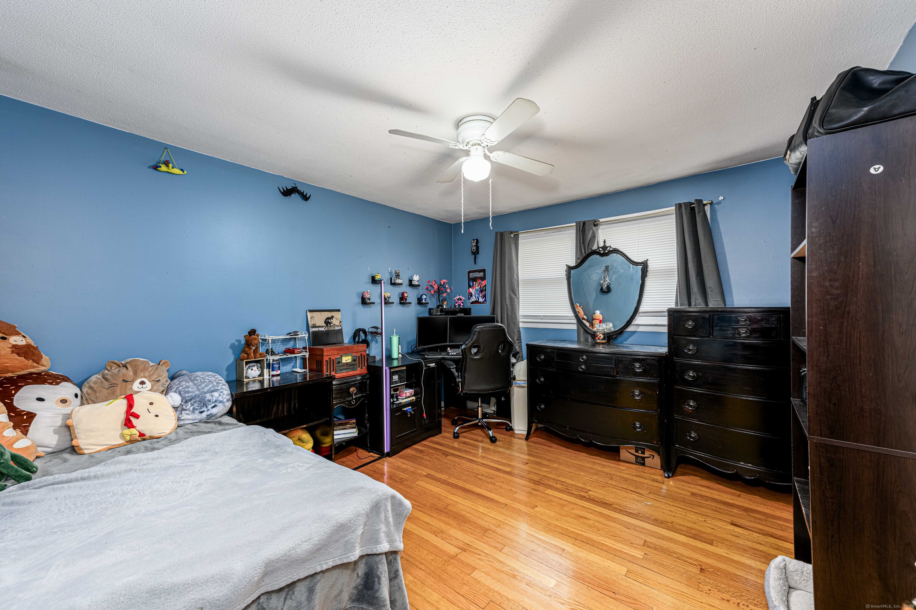 201 Rimmon Road North Haven, CT 06473 - Photo 24 of 40 a bed room with a bed and a dresser