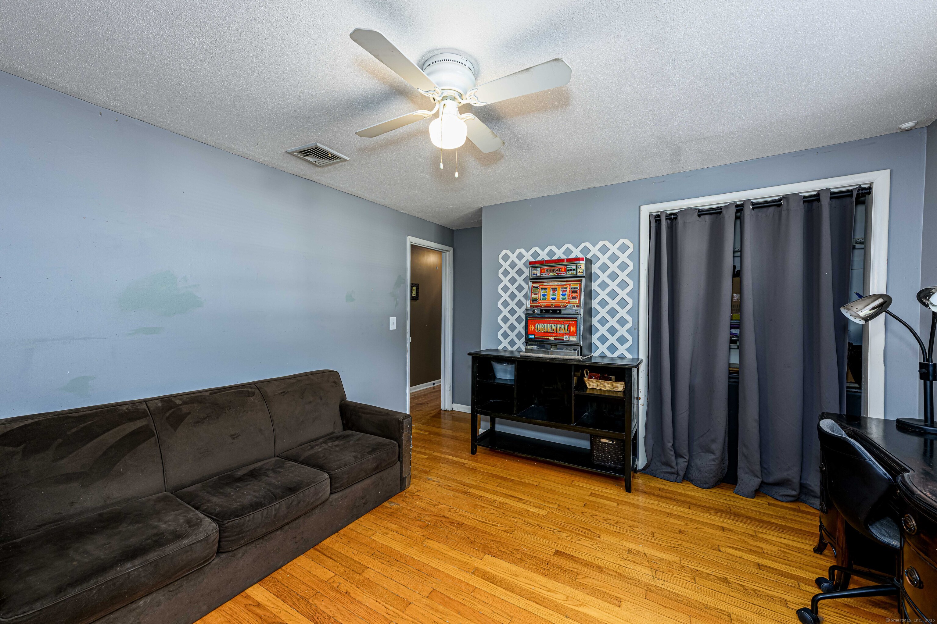 201 Rimmon Road North Haven, CT 06473 - Photo 26 of 40 a living room with furniture and a flat screen tv