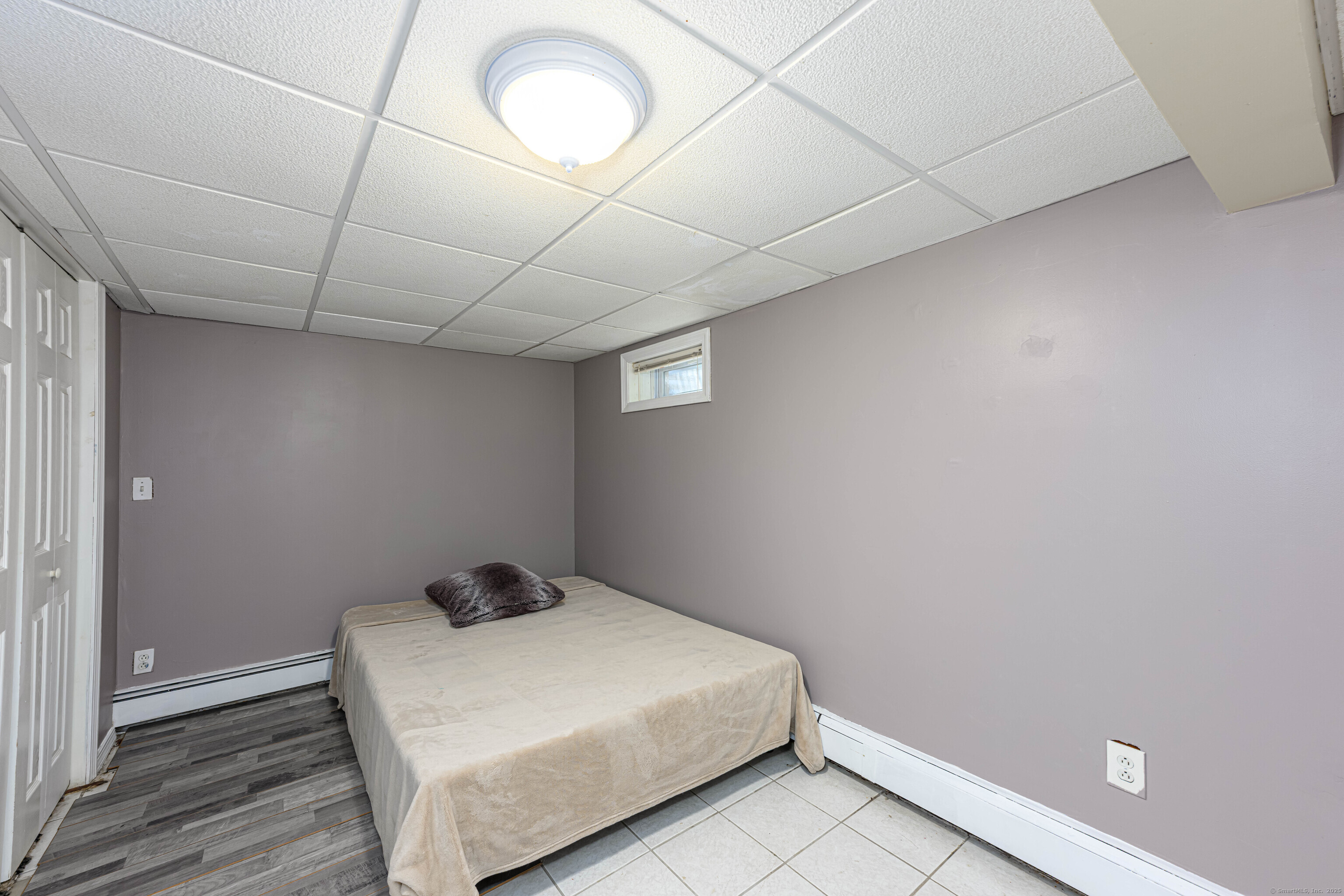 201 Rimmon Road North Haven, CT 06473 - Photo 30 of 40 a bedroom with a bed and a table