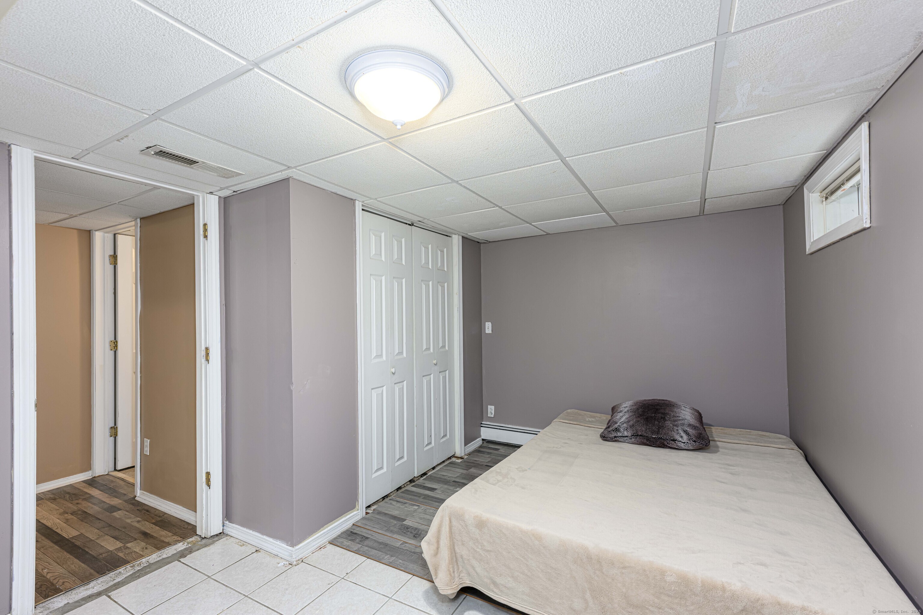 201 Rimmon Road North Haven, CT 06473 - Photo 36 of 40 a bedroom with a bed and a rug