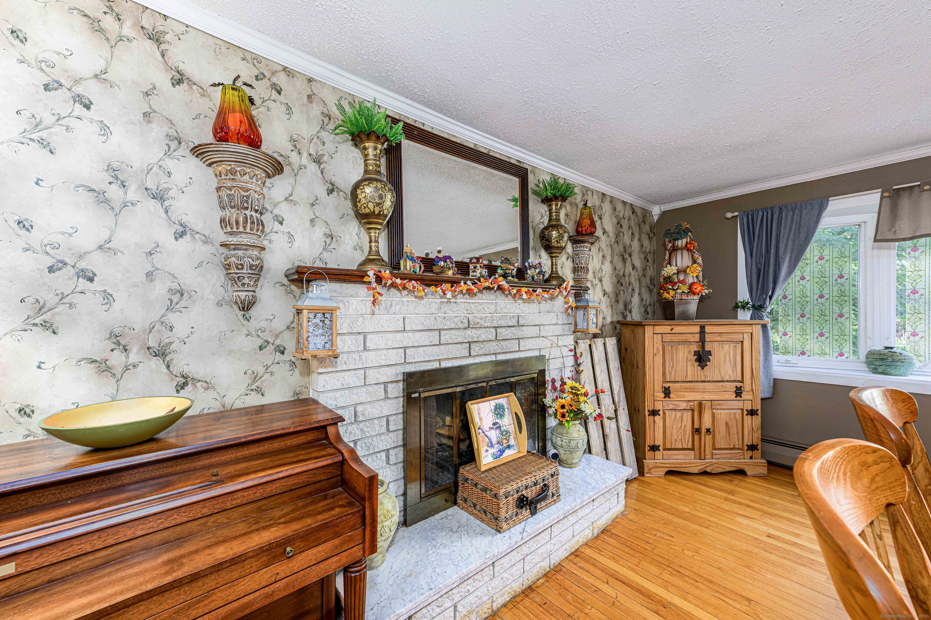 201 Rimmon Road North Haven, CT 06473 - Photo 6 of 40 a living room with furniture and a fireplace