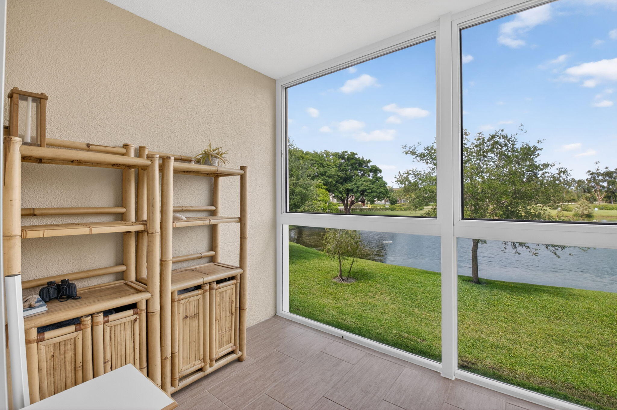 2047 Newcastle A Boca Raton, FL 33434 - Photo 21 of 57 Tranquil Lake & Tree View From Patio