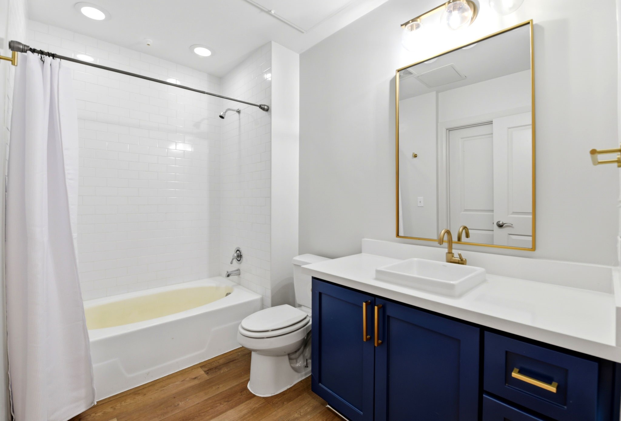 1010 Rosine Street, Unit 43 Houston, TX 77019 - Photo 39 of 48 a bathroom with a sink double vanity and a bathtub