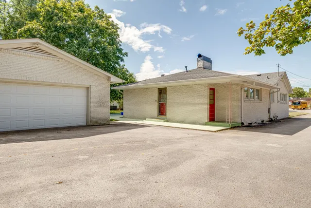 a house with trees in front of it
