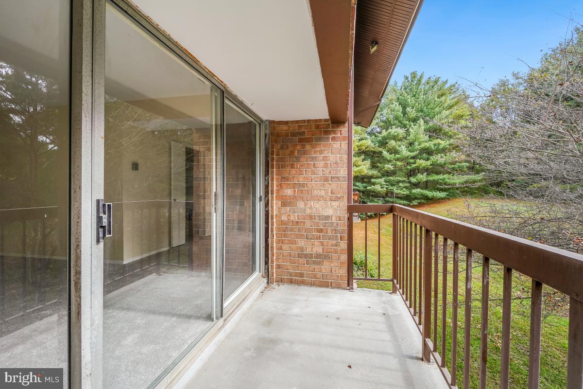 18610 Walkers Choice Road, Unit 18610 Gaithersburg, MD 20886 - Photo 11 of 30 a view of a balcony
