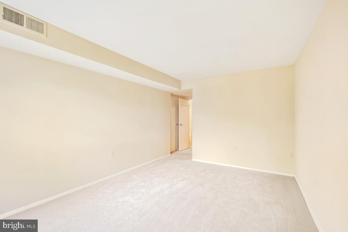 18610 Walkers Choice Road, Unit 18610 Gaithersburg, MD 20886 - Photo 27 of 30 a view of an empty room