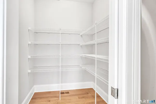 a view of a room with shelves