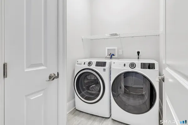 a utility room with dryer and washer