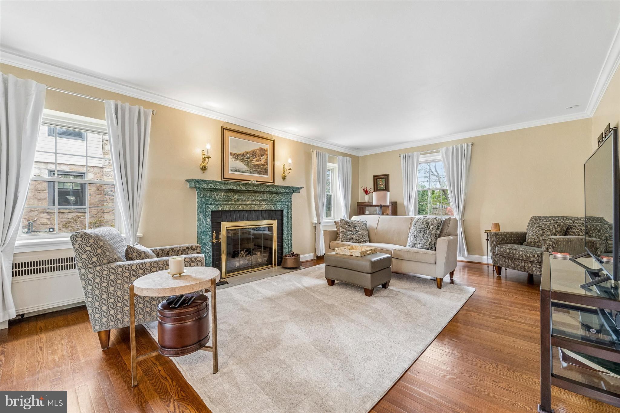 8331 High School Road Elkins Park, PA 19027 - Photo 3 of 42 Spacious living rm with brick-surround fireplace