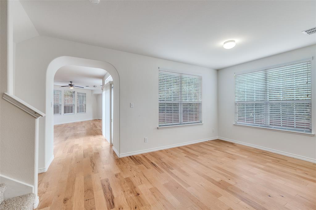 2025 Testament Trail Plano, TX 75074 - Photo 14 of 29 a view of empty room with wooden floor and fan