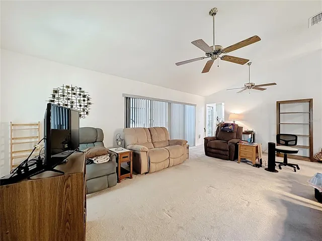 a kitchen with stainless steel appliances granite countertop a stove and a microwave