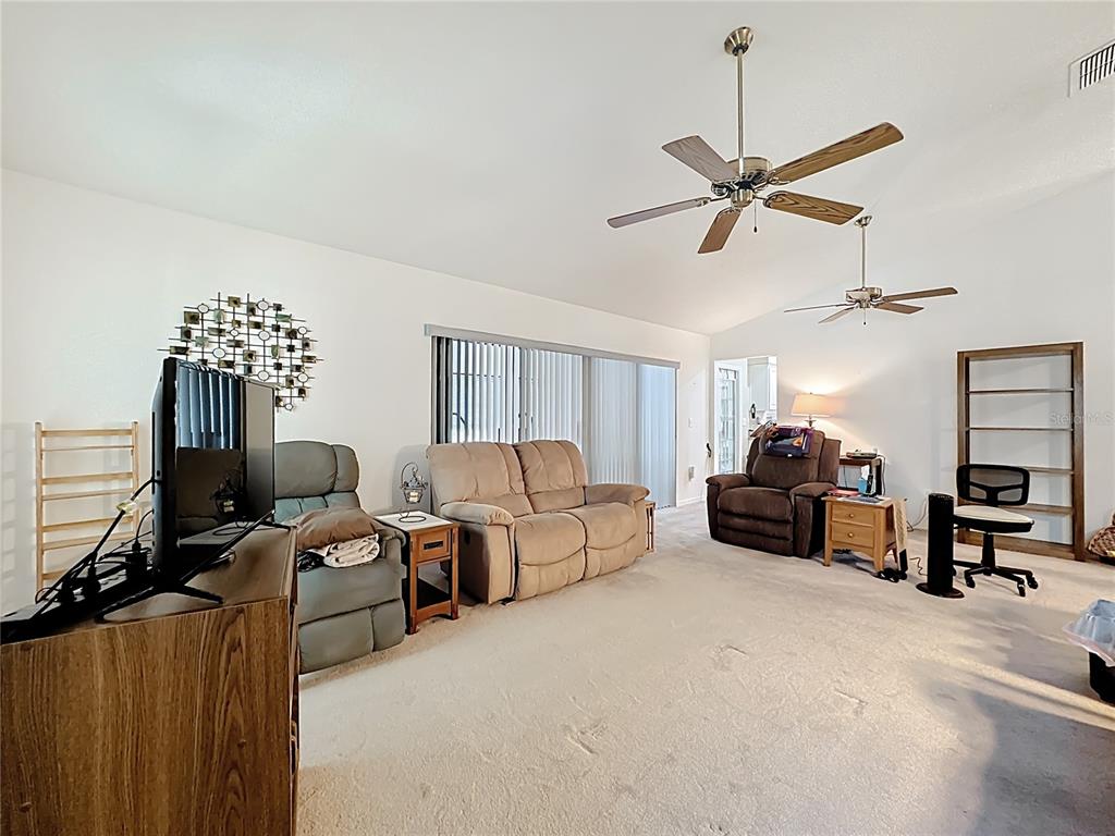Undisclosed Address Winter Springs, FL 32708 - Photo 13 of 66 a living room with furniture