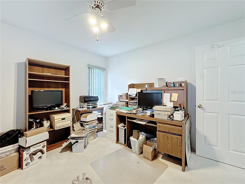 Undisclosed Address Winter Springs, FL 32708 - Photo 30 of 66 a view of a workspace with furniture and cabinet