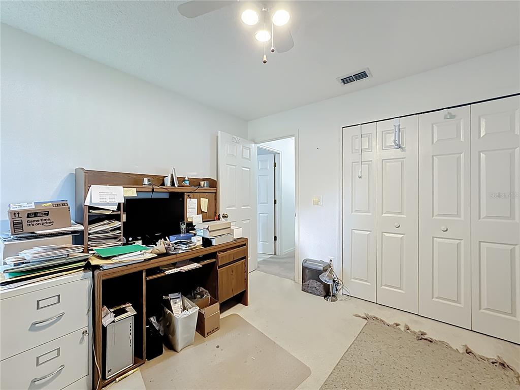 Undisclosed Address Winter Springs, FL 32708 - Photo 31 of 66 a view of a workspace with furniture and a window