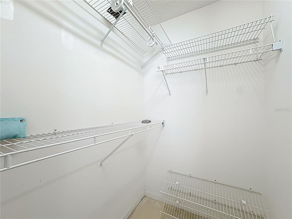 Undisclosed Address Winter Springs, FL 32708 - Photo 32 of 66 a view of a room with racks on the wall