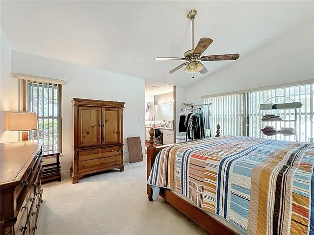 a workspace with furniture and chandelier