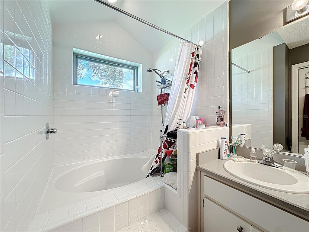 Undisclosed Address Winter Springs, FL 32708 - Photo 39 of 66 a bathroom with a sink and a mirror