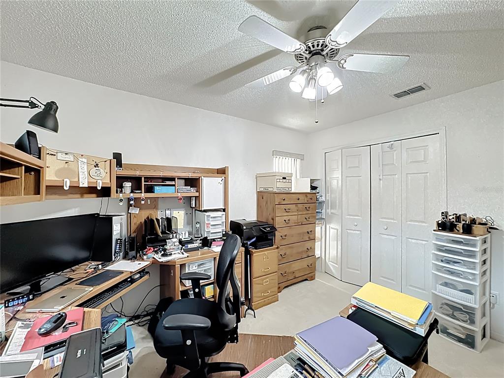 Undisclosed Address Winter Springs, FL 32708 - Photo 43 of 66 a workspace with furniture and chandelier