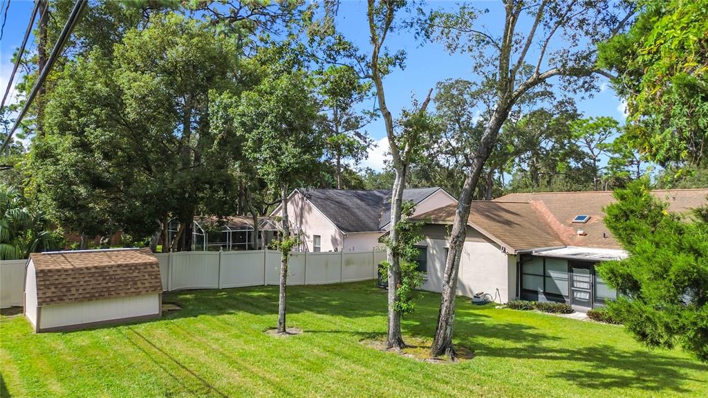 Undisclosed Address Winter Springs, FL 32708 - Photo 58 of 66 a view of a house with a backyard