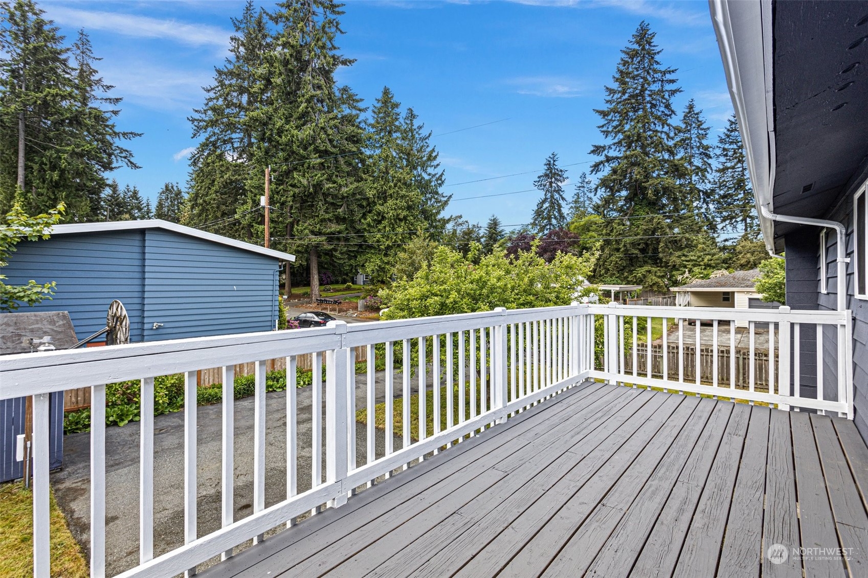 331 North 200th Street Shoreline, WA 98133 - Photo 16 of 28 a view of a wooden roof deck