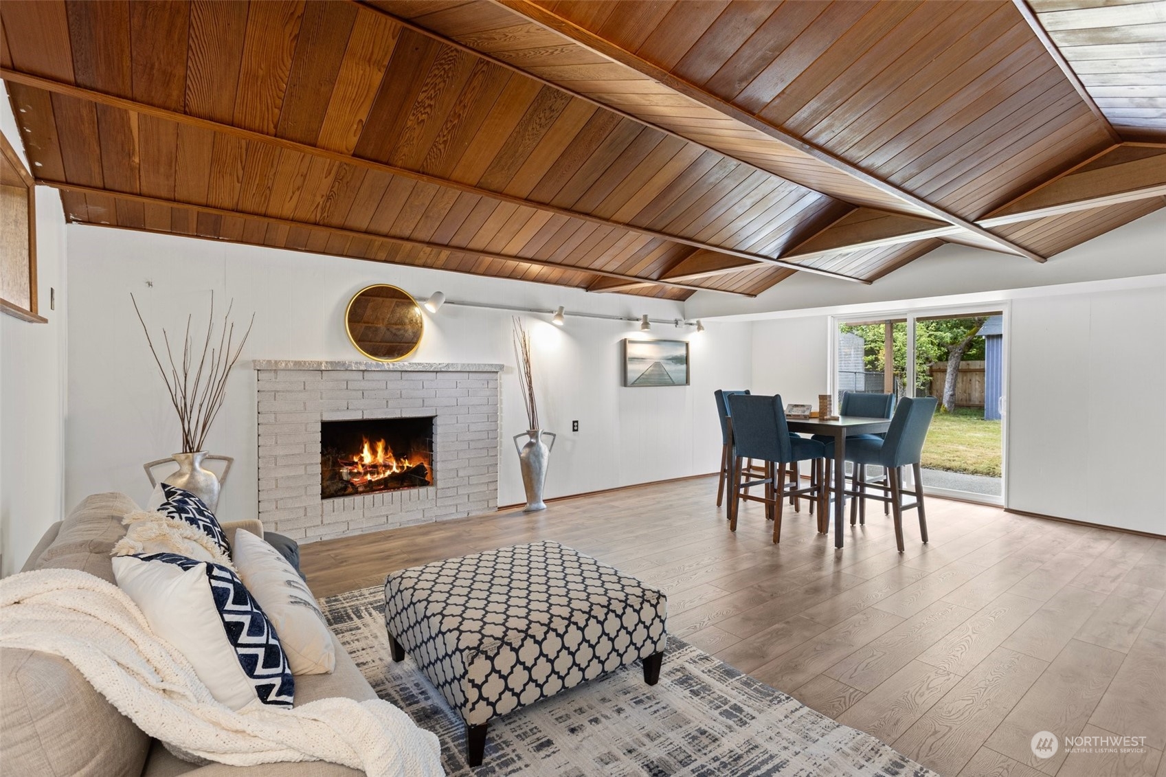 331 North 200th Street Shoreline, WA 98133 - Photo 17 of 28 a living room with furniture and a fireplace