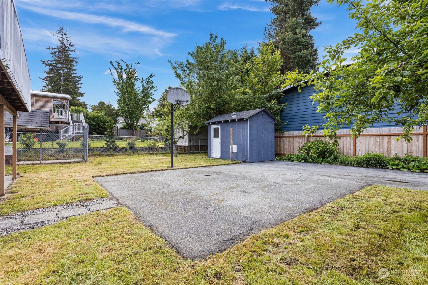 331 North 200th Street Shoreline, WA 98133 - Photo 25 of 28 a view of a house with basketball court