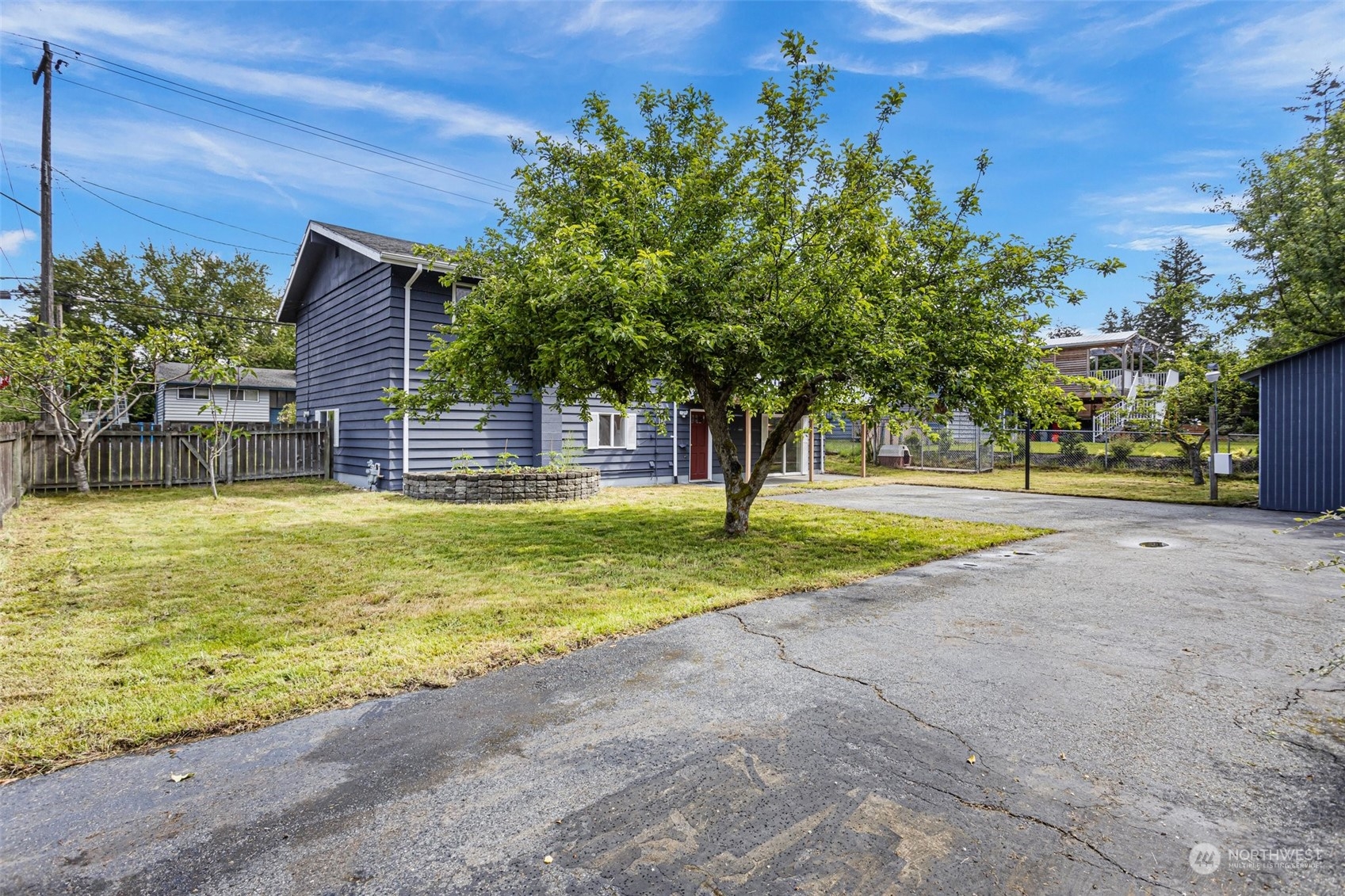 331 North 200th Street Shoreline, WA 98133 - Photo 26 of 28 a swimming pool with outdoor seating and yard