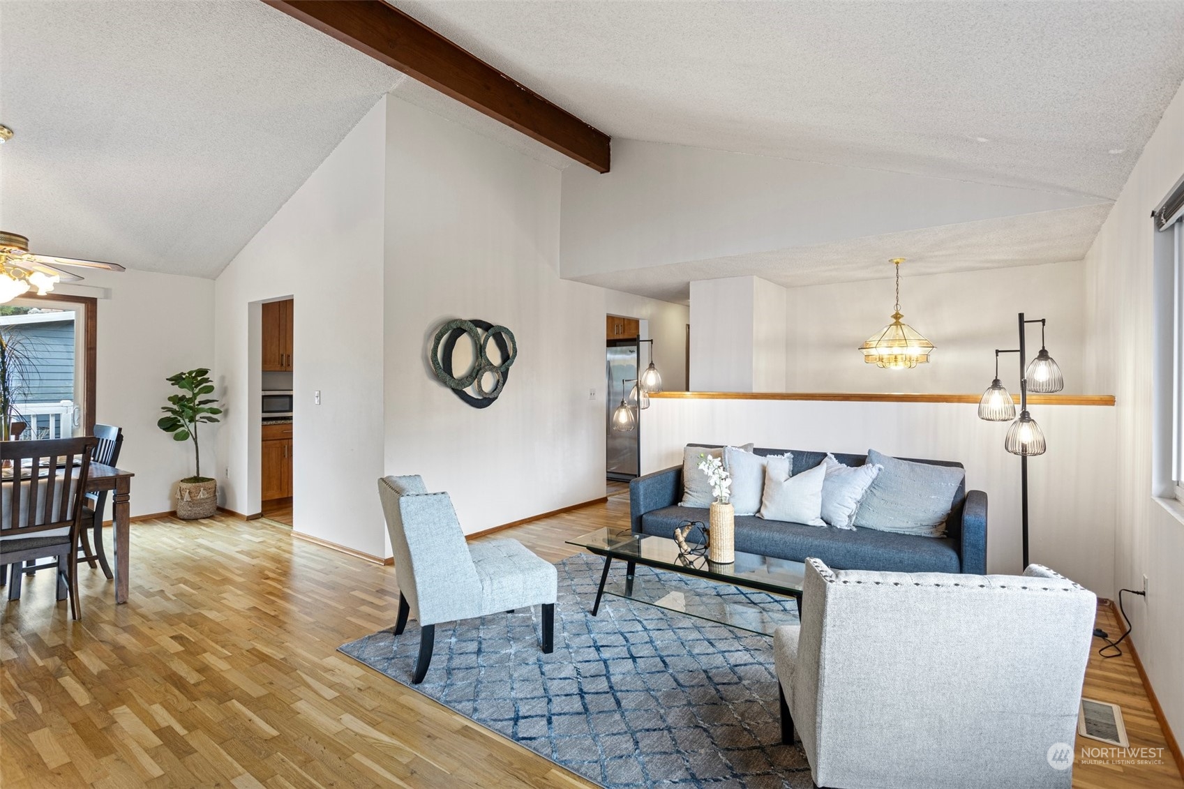 331 North 200th Street Shoreline, WA 98133 - Photo 5 of 28 a living room with furniture and a table