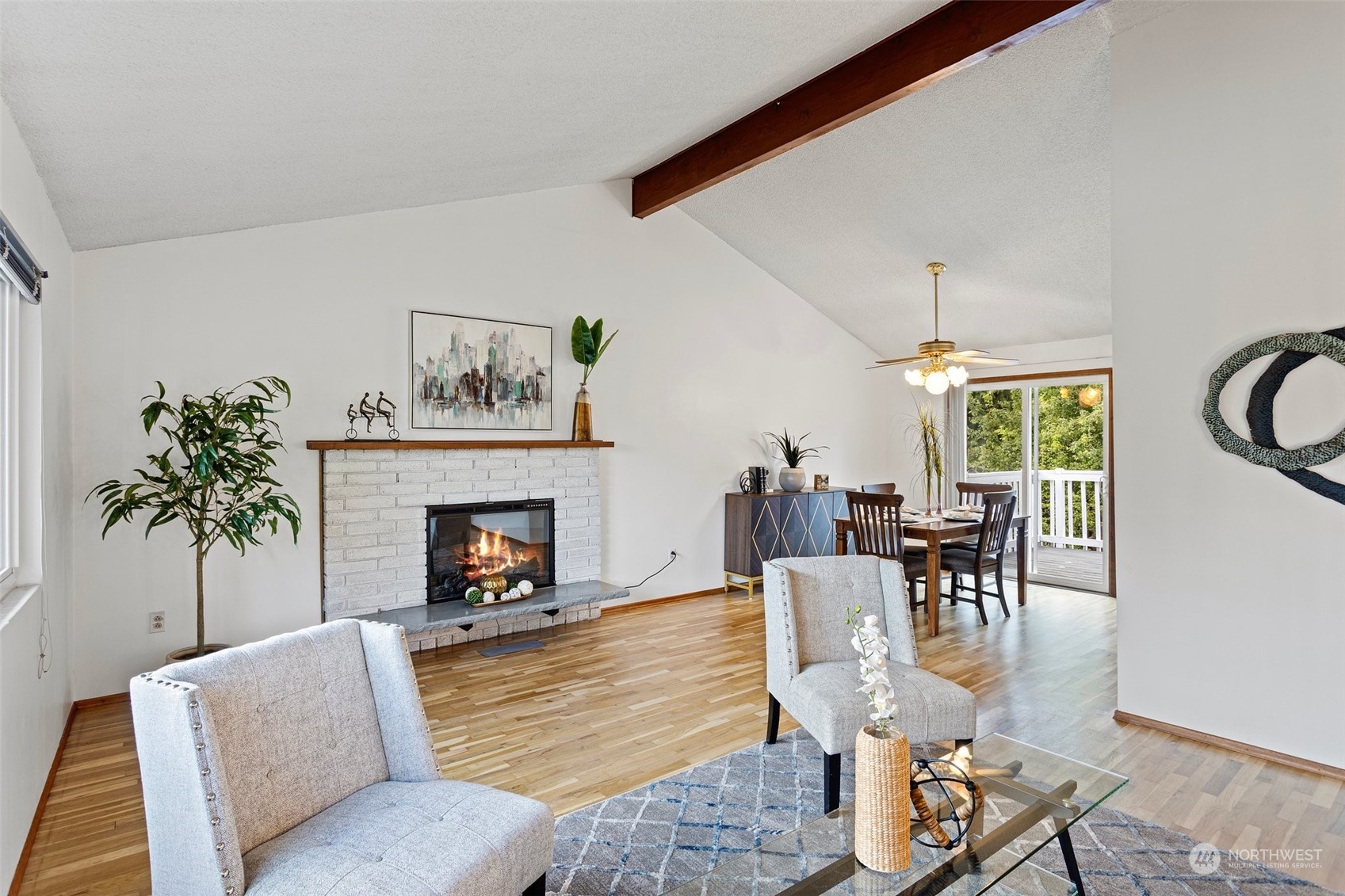 331 North 200th Street Shoreline, WA 98133 - Photo 6 of 28 a living room with furniture and a fireplace