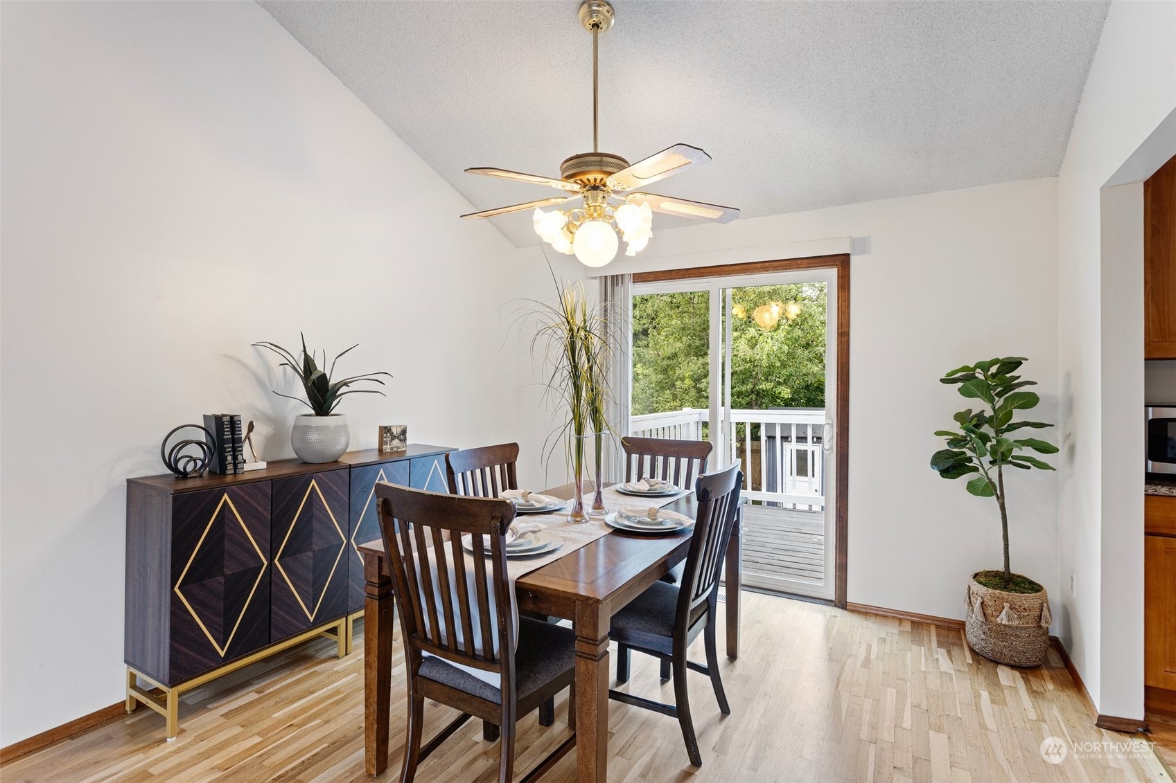 331 North 200th Street Shoreline, WA 98133 - Photo 7 of 28 a view of a dining room with furniture window and wooden floor