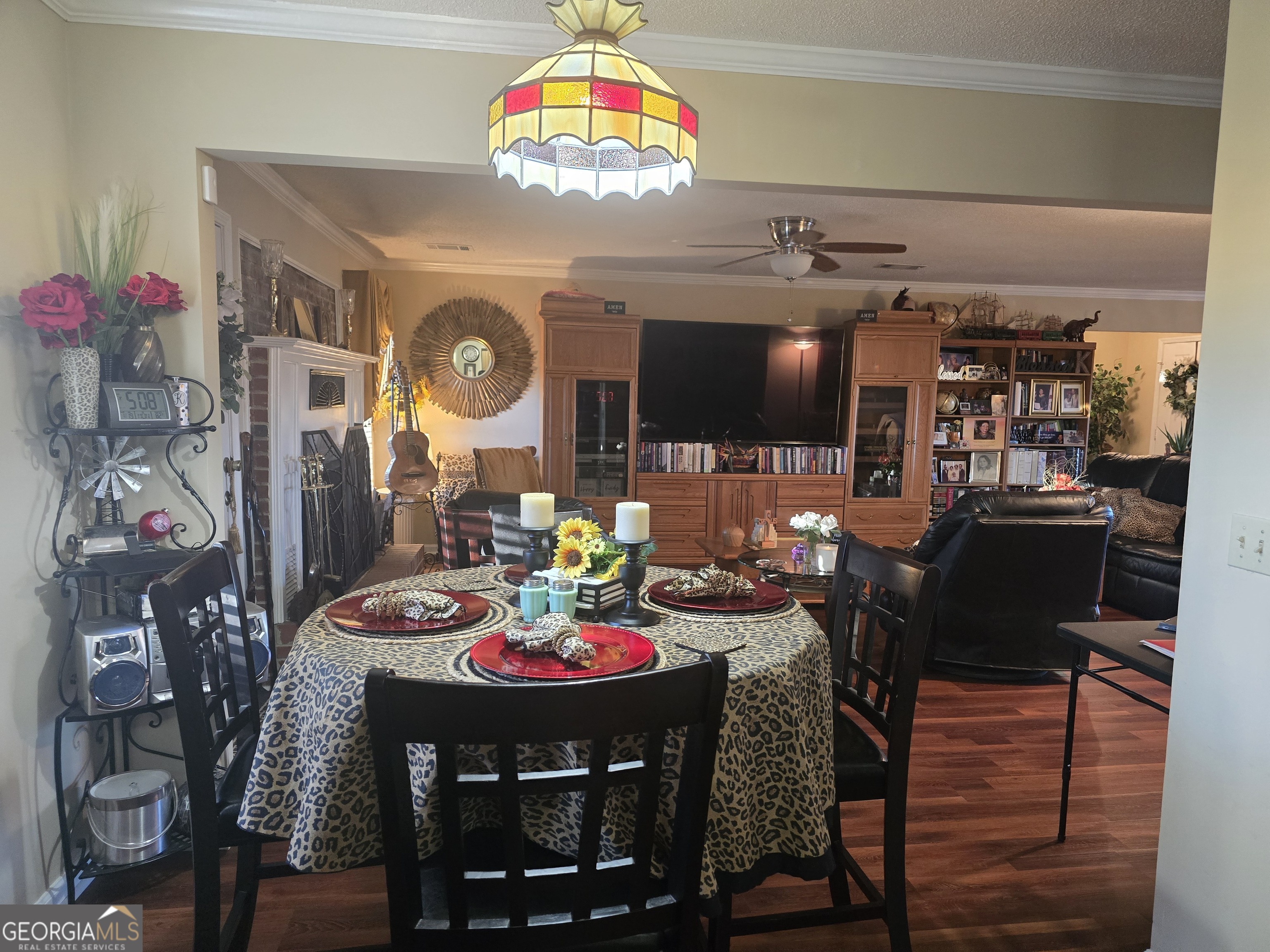 479 Mitchell Loop Bluffton, GA 39824 - Photo 18 of 51 a view of a dining room with furniture and a chandelier