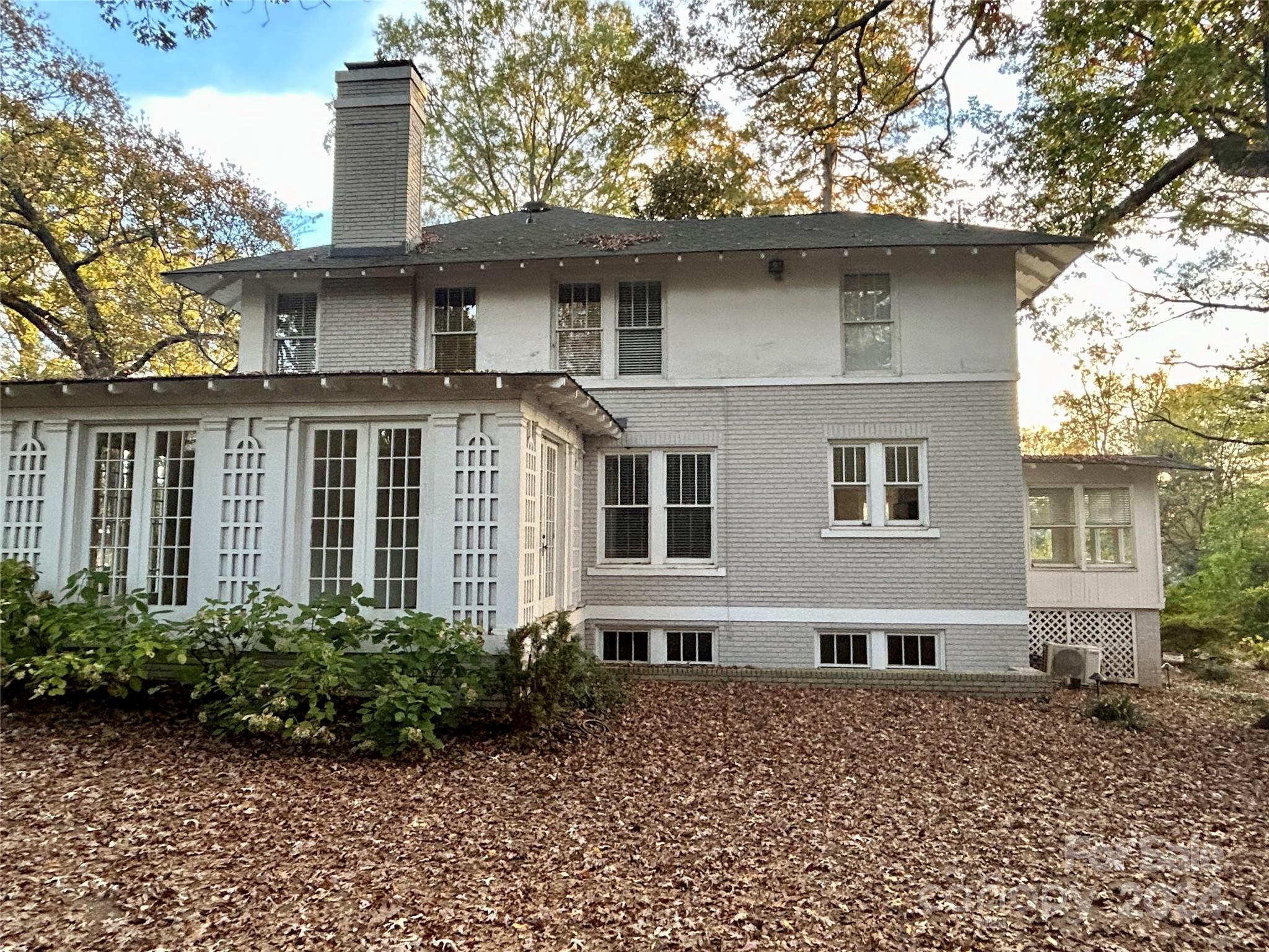 2128 Sharon Road Charlotte, NC 28207 - Photo 2 of 2 a front view of a house with garden