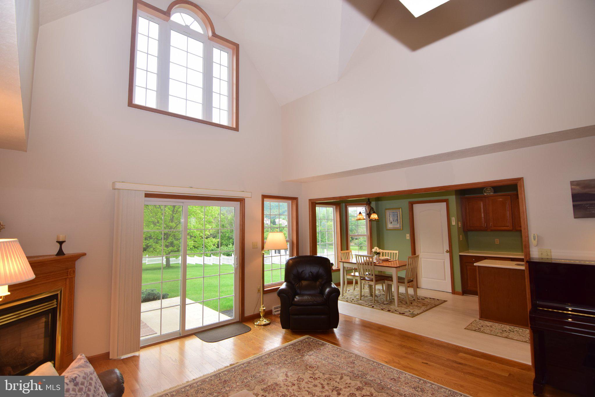 470 Millgate Road Bellefonte, PA 16823 - Photo 15 of 63 a living room with furniture tv and a large window