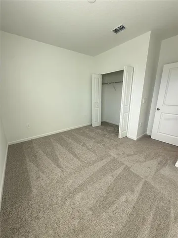 an empty room with a natural light