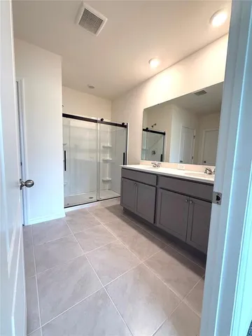 a view of an empty room with a glass door