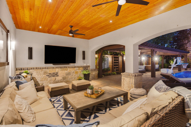 12308 Mariah Circle Draper, UT 84020 - Photo 270 of 293 Covered outdoor patio featuring a wood-finish plank ceiling with recessed lighting and ceiling fans