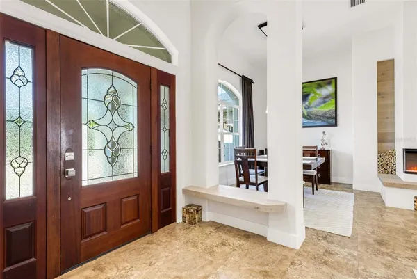 a kitchen with stainless steel appliances granite countertop a stove and cabinets