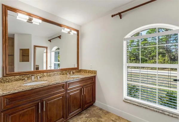 a picture of a bathroom with a shower