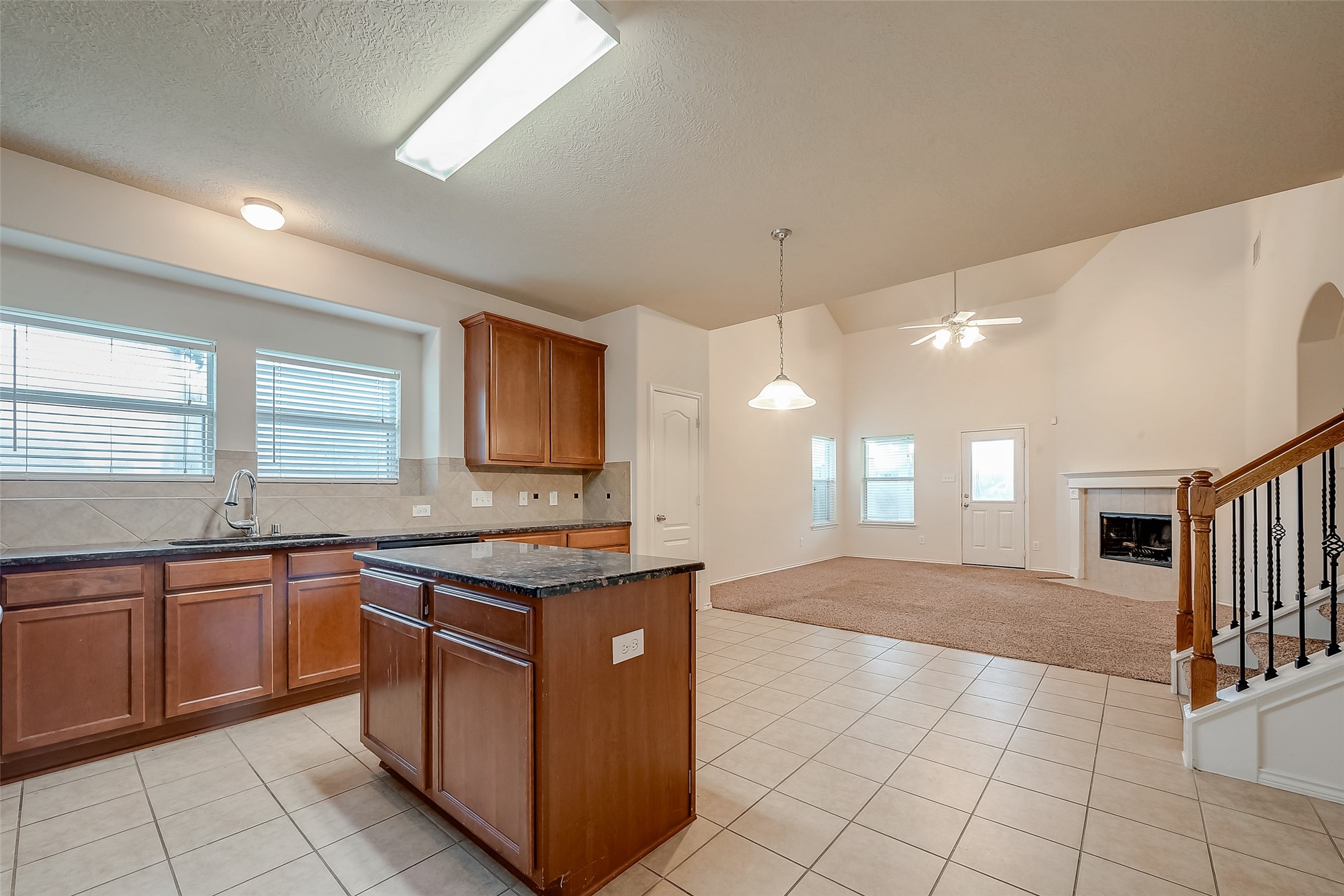 21203 Branchport Drive Houston, TX 77095 - Photo 18 of 49 a kitchen with stainless steel appliances granite countertop a sink and cabinets