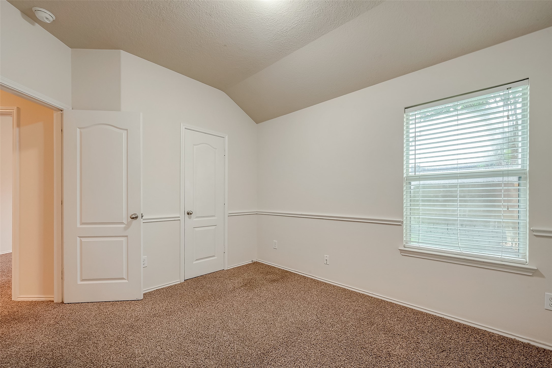 21203 Branchport Drive Houston, TX 77095 - Photo 29 of 49 a view of an empty room with a window