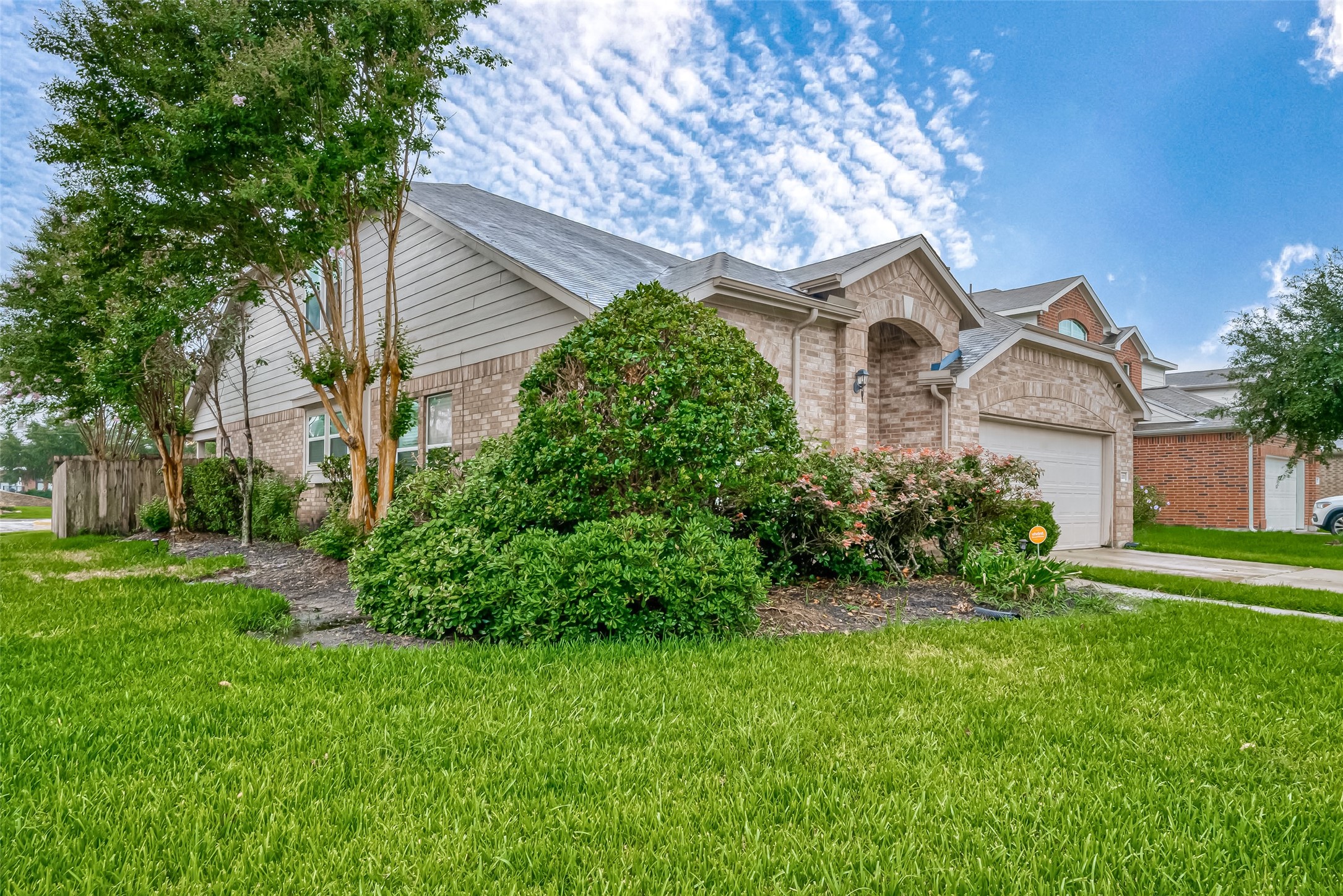 21203 Branchport Drive Houston, TX 77095 - Photo 3 of 49 a front view of a house with a yard